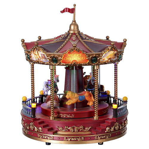 Red Christmas carousel with music, lights, and movement 23x25 cm 4