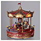 Red Christmas carousel with music, lights, and movement 23x25 cm s7
