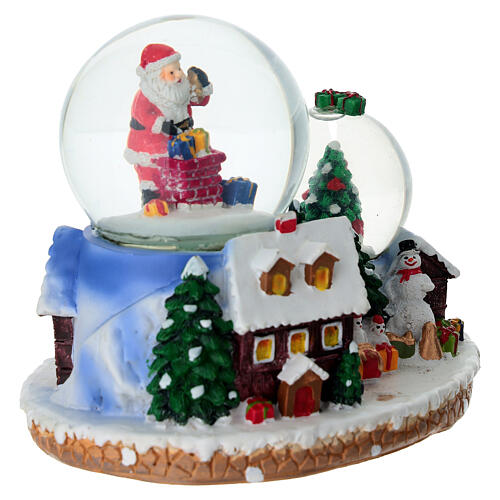 Bola de nieve regalos Papá Noel y pueblo 15x10x12 cm 4