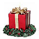 Bougie en forme de cadeau sur une couronne 13x10 cm s1