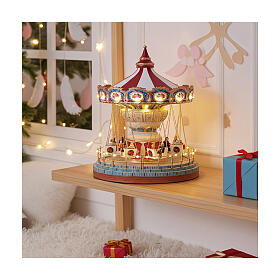 Merry-go-round music box with animated seats, LED lights and music, 10x10x12 in