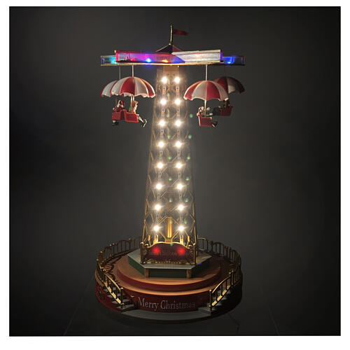 Weihnachtskarussell mit Fallschirmen, animiert, LEDs und Musik – 25x25x45 cm 5