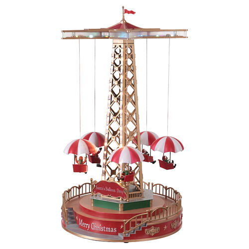 Manège de Noël avec parachutes animés, lumières et musique 25x25x45 cm 3