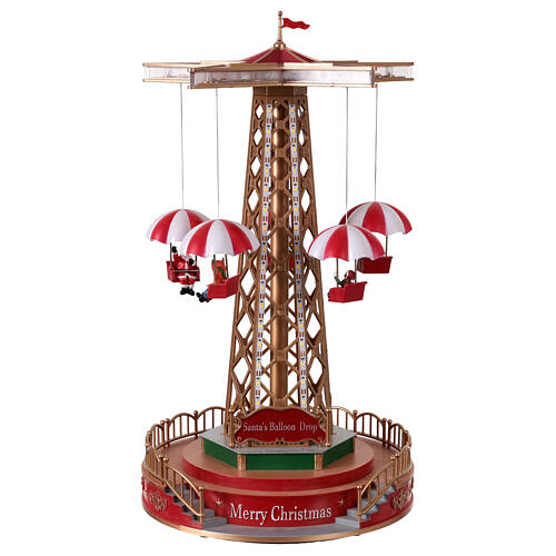 Manège de Noël avec parachutes animés, lumières et musique 25x25x45 cm 5