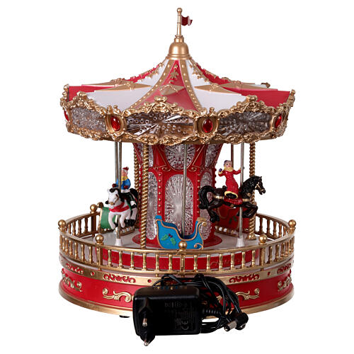 Animated Christmas carousel with horses, lights, and music, 10x10x12 in 6