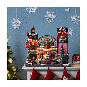 Casa di Babbo Natale animata 50x30x40 cm