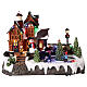Casa di Natale con pattinatori sul ghiaccio animati 35x20x25 cm s1