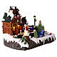 Casa di Natale con pattinatori sul ghiaccio animati 35x20x25 cm s4