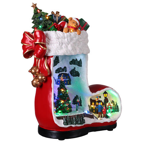 Christmas boot music box with animated village, 14x8x17 in 4