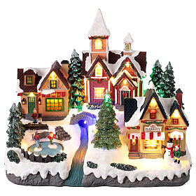 Christmas village scene with animated skaters lights, 35x20x30 cm