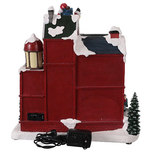 Maison rouge du Père Noël animée par des LEDs et musique 30x20x35 cm 5