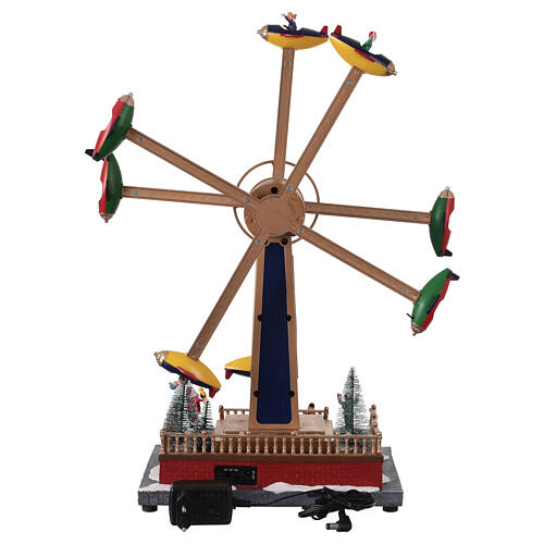 Christmas merry-go-round with airplanes: animated scene with lights and music, 14x7.5x19 in 6