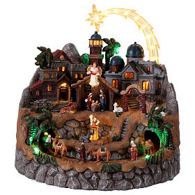 Animated Nativity village with LED lights and music, 16 in