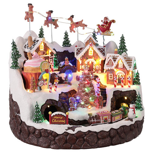 Gingerbread village with animated train, lights, and music, 16.5x15.5x14.5 in 4