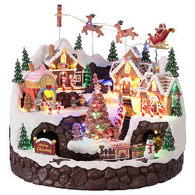 Gingerbread village with animated train lights and music, 42x40x35 cm