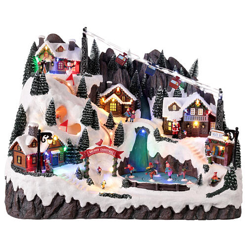 Scena di montagna con bambini che pattinano animati luci e musica 55x35x40 cm 1
