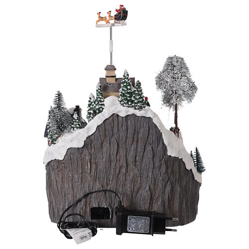 Montagna con pista di pattinaggio e slitta animata luci e musica 30x20x30 cm 5