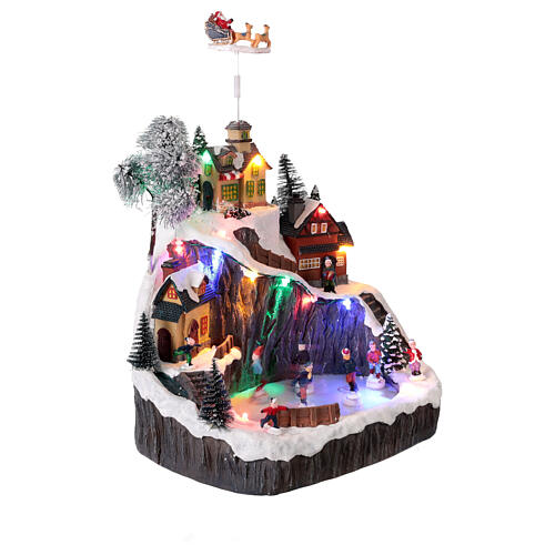 Mountain with animated skating rink, sleigh lights, and music 30x20x30 cm 4