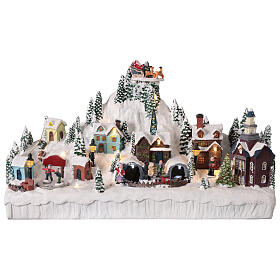 Village de montagne enneigé animé lumières et musique 45x12x25 cm