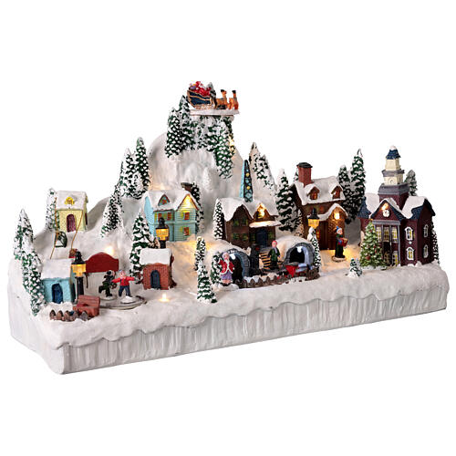 Città di campagna innevata animata luci e musica 45x12x25 cm 4