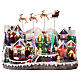 Villaggio di Natale con renne e Babbo Natale volanti animati luci e musica 40x25x30 cm s1