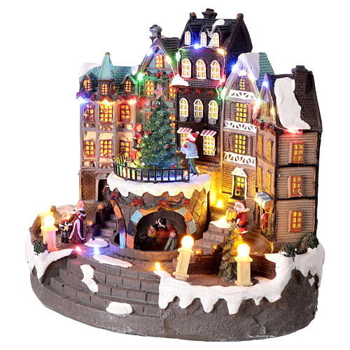 Câmara municipal com árvore de Natal no centro em movimento, luzes e música 30x20x25 cm 3