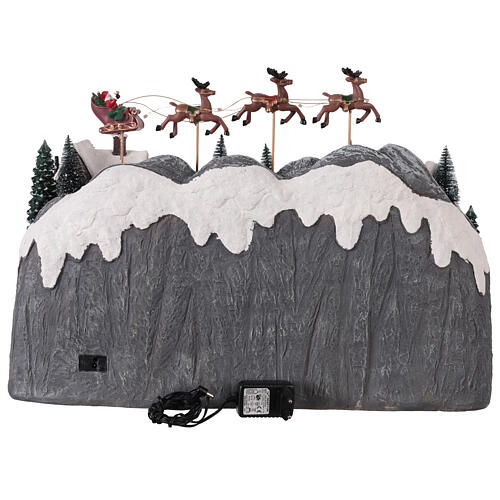 Villaggetto di montagna con ruscello e pattinatori animati luci e musica 60x35x40 cm 7