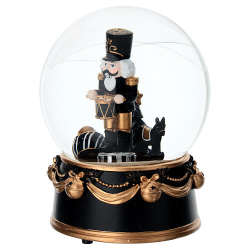 Palla di neve schiaccianoci finitura nera e bronzo con musica 12x15 cm 3
