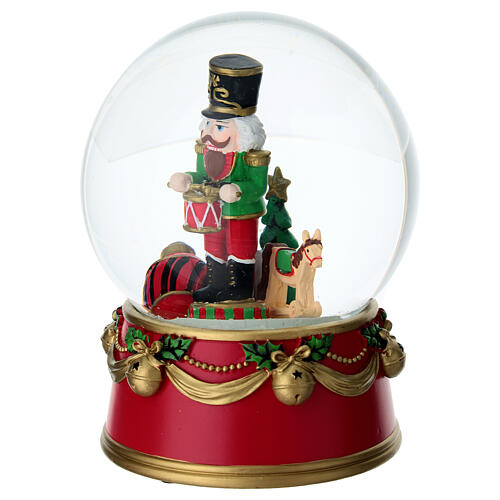 Snow globe with nutcracker, red finish, 5x6 in 3