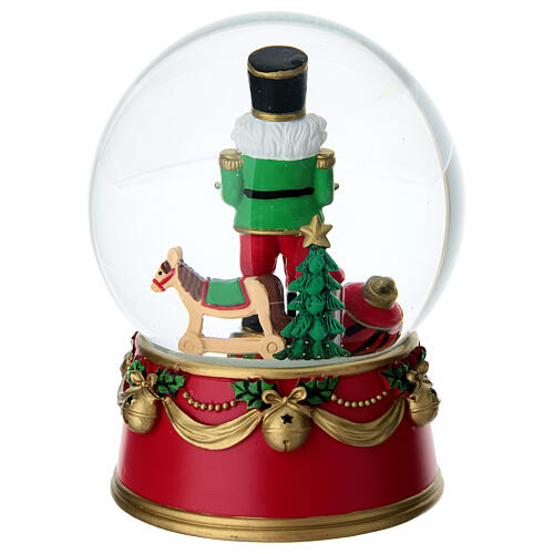 Snow globe with nutcracker, red finish, 5x6 in 5