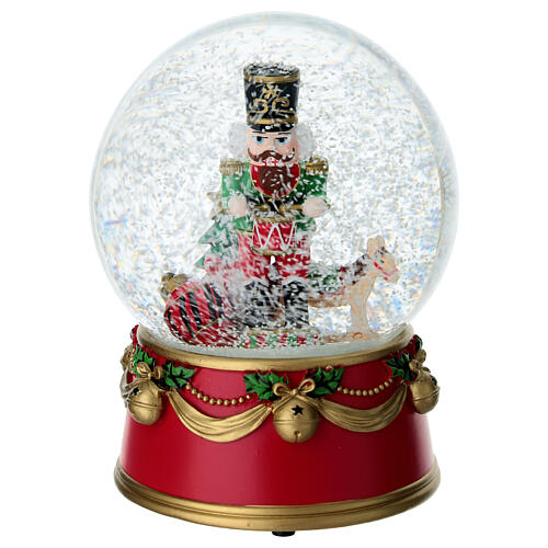 Nutcracker Snow globe with red finish, 12x15 cm 2