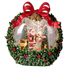 Ghirlanda agrifogli palla di neve Babbo Natale neve, luci e musica 20x10x20 cm