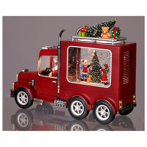 Boule à neige camion conduit par le Père Noël 30x10x20 cm 3
