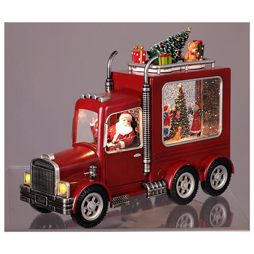 Boule à neige camion conduit par le Père Noël 30x10x20 cm 4