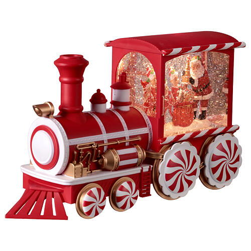 Locomotiva con neve caramelle musica e luci 30x10x15 cm 3