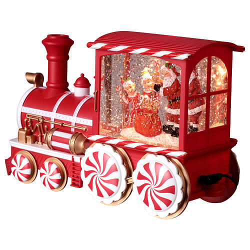 Locomotiva con neve caramelle musica e luci 30x10x15 cm 4