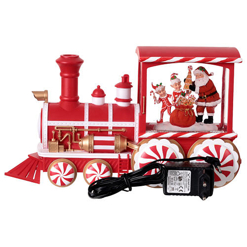 Locomotiva con neve caramelle musica e luci 30x10x15 cm 7
