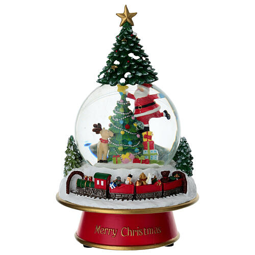 Snow globe: Santa decorating a tree, 6x10 in 1