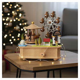 Wooden amusement park music box with carousel and ferris wheel, 4x6x6 in