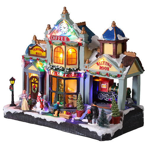 Villaggio Natalizio con stazione e gift shop luci e musica 40x20x35 cm 3