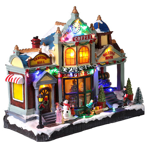 Villaggio Natalizio con stazione e gift shop luci e musica 40x20x35 cm 4