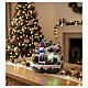Christmxas village with illuminated moving train and music, battery-powered setting, 8x8 in s2