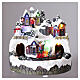 Christmxas village with illuminated moving train and music, battery-powered setting, 8x8 in s5