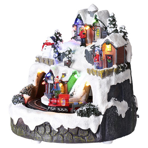 Villaggio natalizio illuminato trenino in movimento musica a batteria 20x20 cm 3