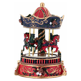 Carrousel boîte à musique rouge et bleu en résine 15x10 cm