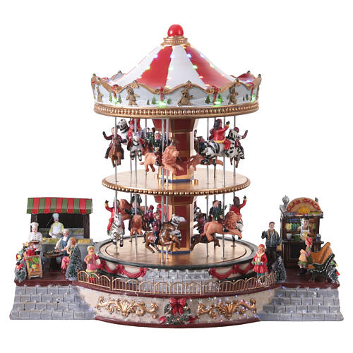 Village de Noël carrousel deux étages animaux et musique 35x40x30 cm 1