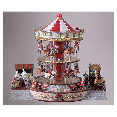 Village de Noël carrousel deux étages animaux et musique 35x40x30 cm 2