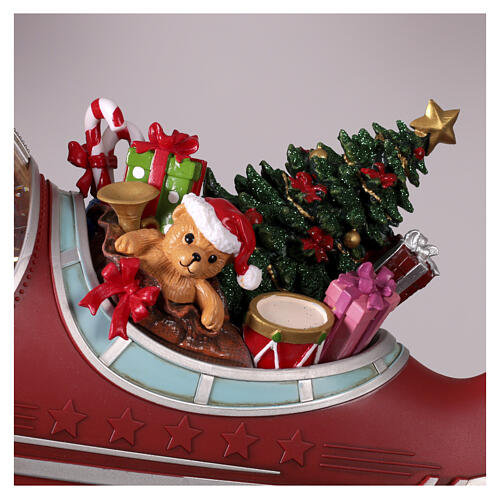 Babbo natale in aereo con doni 25x45x35 cm 10