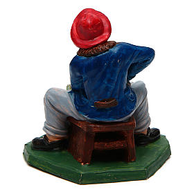 Uomo con ombrello verde di 10 cm presepe