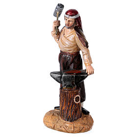 Fabbro con incudine per presepe di 10 cm resina colorata